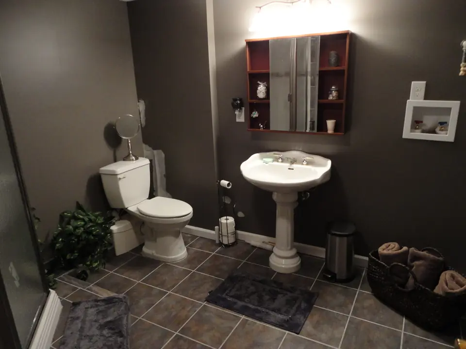 Basement bath with a pedestal sink