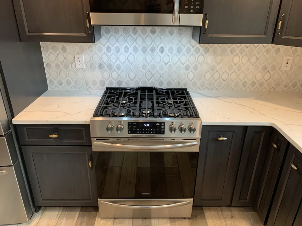 Range with a mosaic backsplash